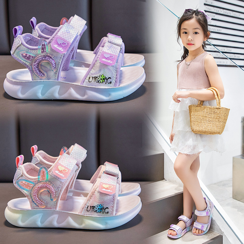 Mùa hè mới cô gái Sandals Magic Stick Soft đế cô gái nhỏ bãi biển giày sequin lộ ngón chân trẻ em giải trí giày đầy màu sắc polyurethane
