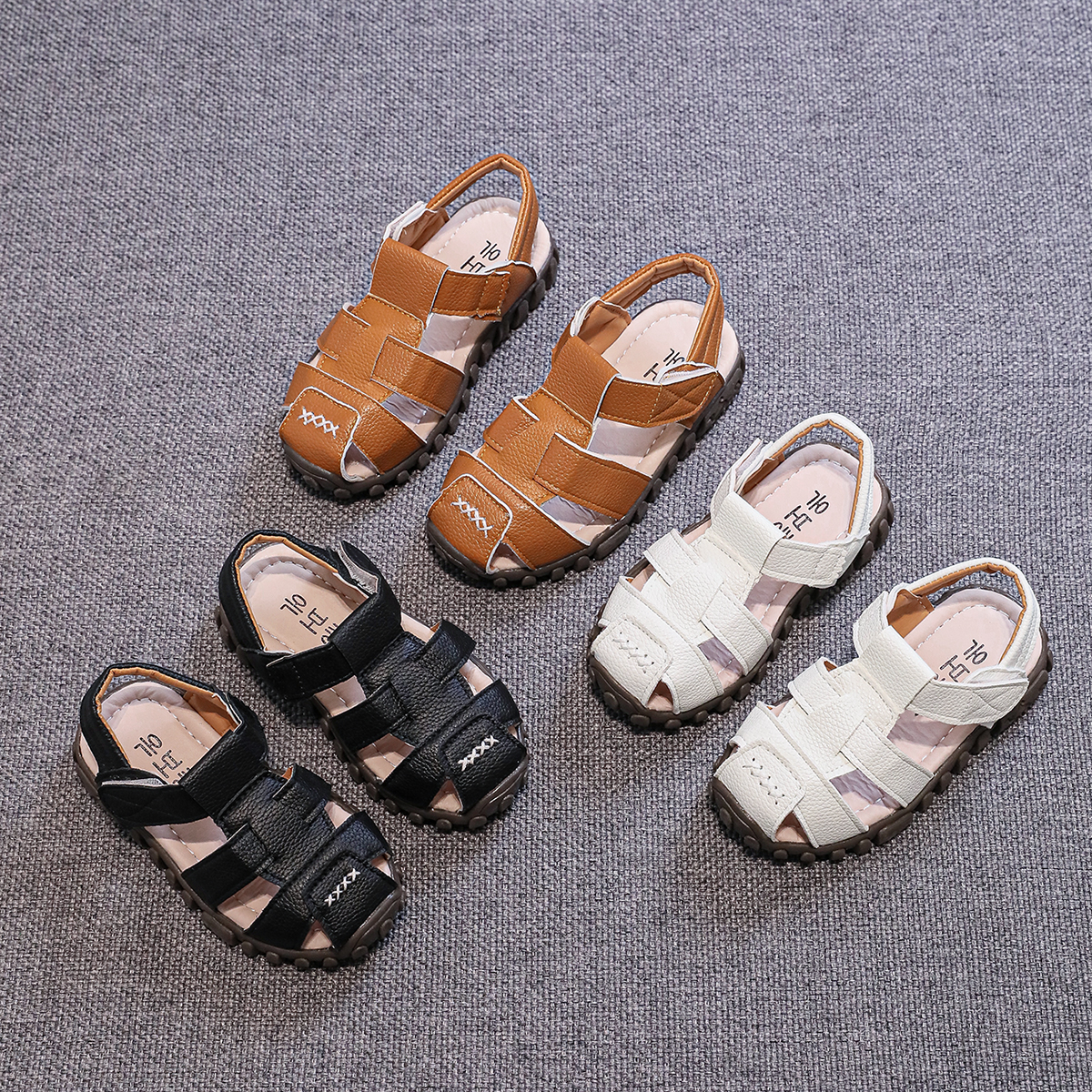 Summer children's shoes, toe wrapped sandals, cow tendon soled men's sandals, fashionable Velcro anti slip children's leather sandals, cross-border, year-round stable supply and distribution